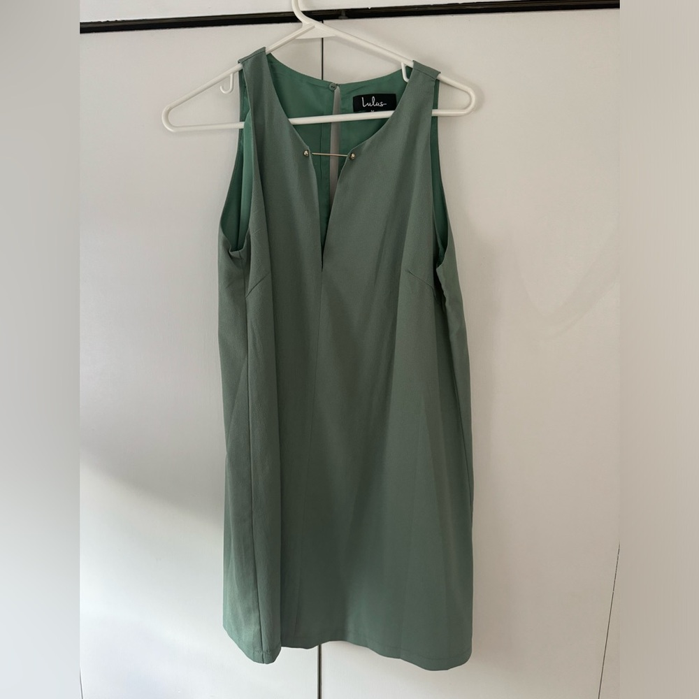 Sage shift dress with gold bar detail